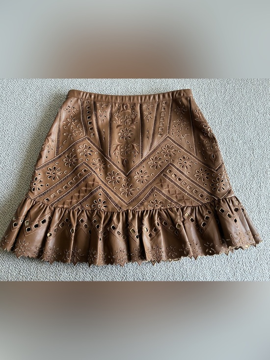 Christy Lynn Dresses & Skirts - Christy Lynn Ashley Skirt S
Camel Vegan Leather Laser Cut
Floral Ruffle.